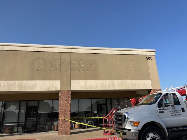 Before — Stucco Fascia — Storefront Refresh